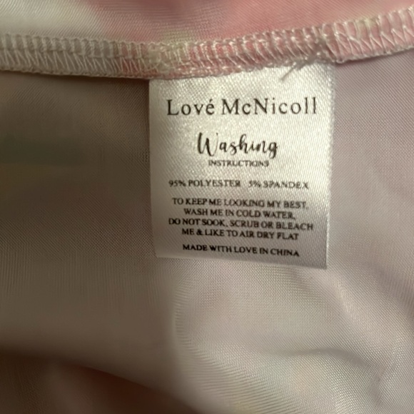 Love McNicoll pretty pastel coloured dress with a peach long camisole underneath - Picture 7 of 7